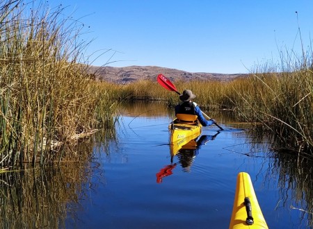 Kayaking through reeds to Uros.jpg