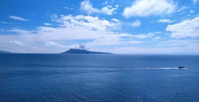 In the blue horizon the Island of Amantani