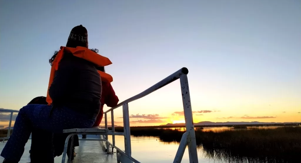 At the time sun is rising over the highest navigable Lake