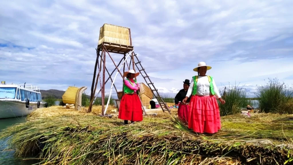 Women on a reed floating Island on Lake Titicaca