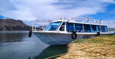 Covered section motor boat on Lake Titicaca