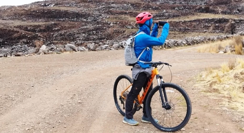 Taking a moment for picture after cycling in the Andes