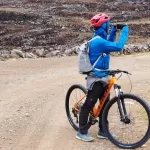 Taking a moment for picture after cycling in the Andes