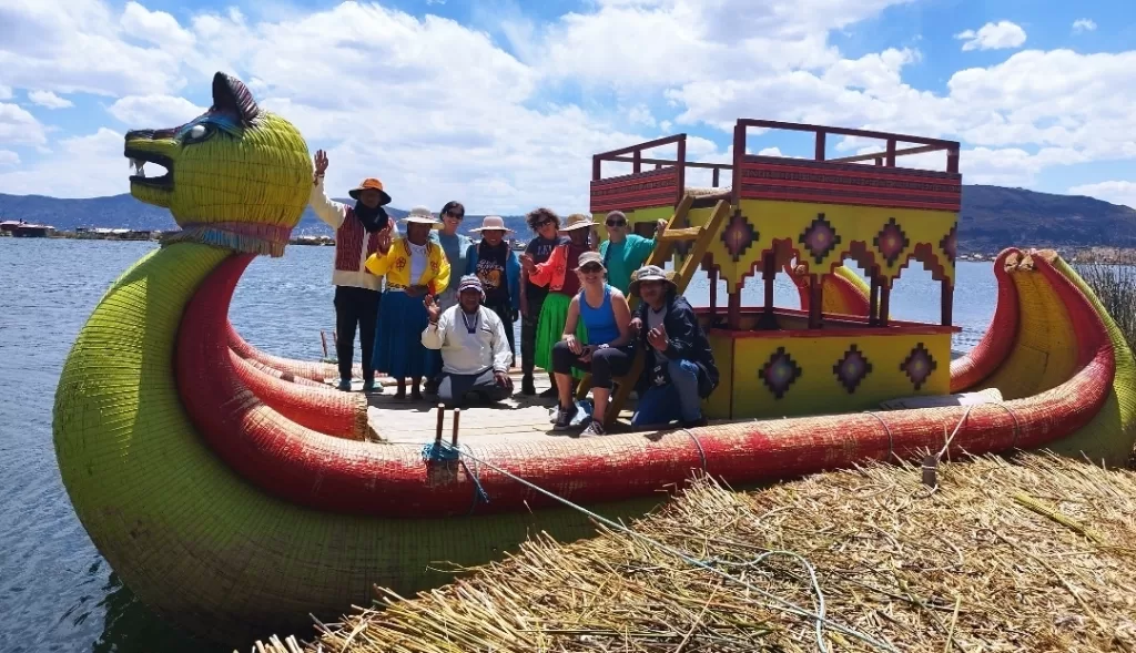 Posing for the perfect shot on a reed boat at Uros Islands