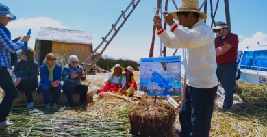 Local man explaining about the reed islands building