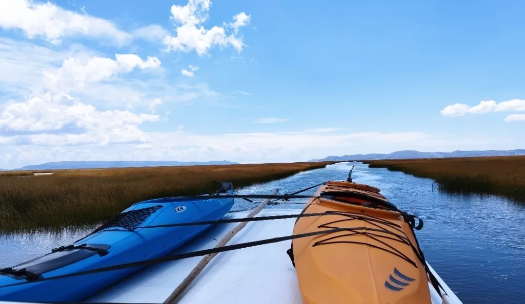 Transporting the kayaks back from Amantani