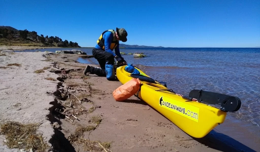 On the sandy beach of Llachon shoreline