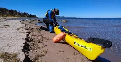 On the sandy beach of Llachon shoreline