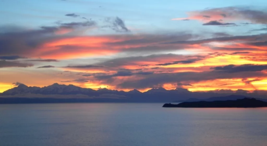 Moon Island sunrise view from Sun Island on Lake Titicaca Bolivia