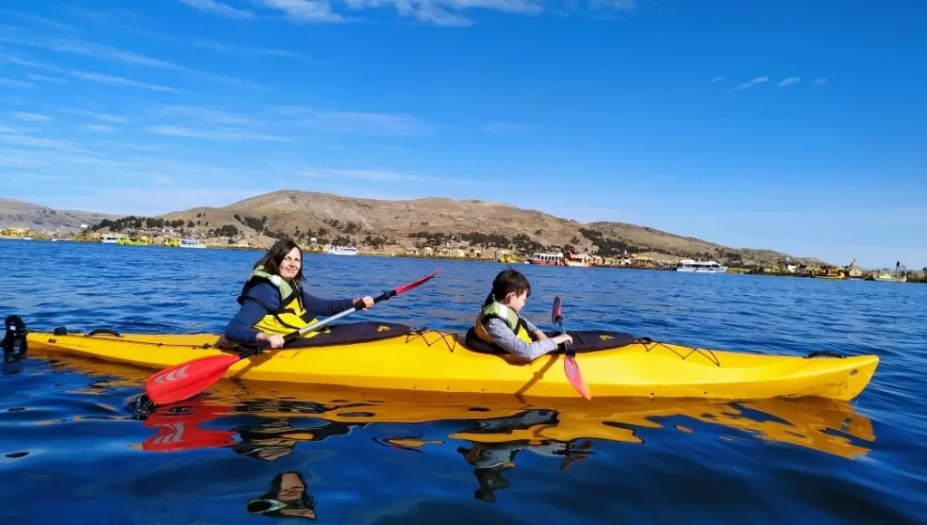 Mom and son having unique adventure in the highest lake